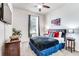 Guest bedroom with a comfortable bed and stylish decor at 4973 Pall Mall W St, Kissimmee, FL 34758