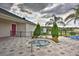 Relaxing community hot tub and surrounding landscaping at 4973 Pall Mall W St, Kissimmee, FL 34758