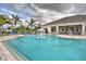 Refreshing community pool with mushroom fountain at 4973 Pall Mall W St, Kissimmee, FL 34758