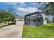 Single-story home with attached garage and screened lanai at 4973 Pall Mall W St, Kissimmee, FL 34758