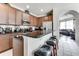 Kitchen with granite countertops and stainless steel appliances at 4973 Pall Mall W St, Kissimmee, FL 34758