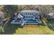 Luxury home with private pool and expansive backyard, located on the lake at 6025 Lady Bet Dr, Orlando, FL 32819