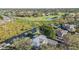 Waterfront home with private dock, nestled near a golf course at 6025 Lady Bet Dr, Orlando, FL 32819