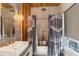 Bathroom with walk-in shower, modern sink, and a unique shower curtain at 6025 Lady Bet Dr, Orlando, FL 32819