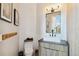 Contemporary powder room featuring a sleek sink and modern wall decor at 6025 Lady Bet Dr, Orlando, FL 32819