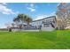 Two-story home with large backyard, pool, and waterfront access at 6025 Lady Bet Dr, Orlando, FL 32819