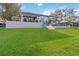 Two-story home with large backyard, pool, and waterfront access at 6025 Lady Bet Dr, Orlando, FL 32819