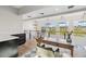 Home office with light wood floors and a view from the upper level at 6025 Lady Bet Dr, Orlando, FL 32819
