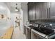 Bright laundry room with built-in bench, washer, dryer, and access to another room at 6025 Lady Bet Dr, Orlando, FL 32819
