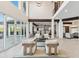 Open-concept living room with high ceilings and expansive glass doors to the patio at 6025 Lady Bet Dr, Orlando, FL 32819