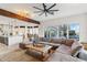 Spacious living area connects to the kitchen and features access to outdoor seating at 6025 Lady Bet Dr, Orlando, FL 32819