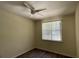 Bright bedroom with ceiling fan and large window at 860 N Orange Ave # 118, Orlando, FL 32801