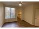 Bright bedroom with large window and walk-in closet at 860 N Orange Ave # 118, Orlando, FL 32801