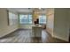 Modern dining area with kitchen island and hardwood floors at 860 N Orange Ave # 118, Orlando, FL 32801