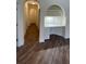 Bright hallway with built-in desk and hardwood floors at 860 N Orange Ave # 118, Orlando, FL 32801