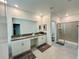 Modern bathroom with double vanity and large shower at 8900 Takeaway Way, Davenport, FL 33896