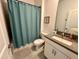 Clean bathroom with tub shower combo, toilet and vanity at 8900 Takeaway Way, Davenport, FL 33896