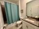 Clean bathroom with tub shower combo, toilet and vanity at 8900 Takeaway Way, Davenport, FL 33896