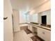 Spa-like bathroom with double vanity, soaking tub at 8900 Takeaway Way, Davenport, FL 33896