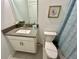 Clean bathroom with single vanity, toilet, and shower at 8900 Takeaway Way, Davenport, FL 33896