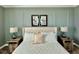 Bright bedroom with a king-size bed and neutral decor at 8900 Takeaway Way, Davenport, FL 33896