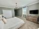 Comfortable bedroom with a king bed and lots of light at 8900 Takeaway Way, Davenport, FL 33896
