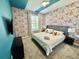 Fun Mickey Mouse bedroom with a king-size bed at 8900 Takeaway Way, Davenport, FL 33896