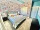 Mickey Mouse themed bedroom with king-size bed and closet at 8900 Takeaway Way, Davenport, FL 33896