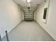 Spacious garage with painted floor at 8900 Takeaway Way, Davenport, FL 33896
