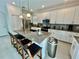 Modern kitchen with an island and breakfast bar seating at 8900 Takeaway Way, Davenport, FL 33896