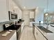 Modern kitchen with stainless steel appliances and ample counter space at 8900 Takeaway Way, Davenport, FL 33896