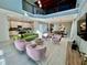 Open concept living room, dining, and kitchen area at 8900 Takeaway Way, Davenport, FL 33896