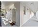 Building hallway with white walls and doors at 1021 Siena Park E Blvd # 103, Kissimmee, FL 34747