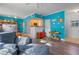 Open living room and kitchen area at 1021 Siena Park E Blvd # 103, Kissimmee, FL 34747