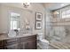 Well-appointed bathroom with granite vanity and glass shower at 1261 Radiant St, Reunion, FL 34747