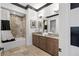 Elegant bathroom with double vanity, granite countertop, and mosaic tile shower at 1261 Radiant St, Reunion, FL 34747