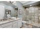 Clean bathroom with double vanity and a large walk in shower at 1261 Radiant St, Reunion, FL 34747