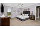 Bright bedroom with a comfortable king-size bed and plenty of natural light at 1261 Radiant St, Reunion, FL 34747