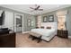 Spacious bedroom featuring a king-size bed and en-suite bathroom at 1261 Radiant St, Reunion, FL 34747