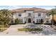 Luxury home with a tile roof and driveway at 1261 Radiant St, Reunion, FL 34747