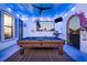 Game room with pool table and balcony view at 1261 Radiant St, Reunion, FL 34747