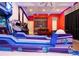 Entertaining game room, featuring lane Primary bowling and various arcade games at 1261 Radiant St, Reunion, FL 34747