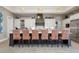 Large kitchen island with seating and stainless steel appliances at 1261 Radiant St, Reunion, FL 34747