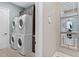 Convenient laundry room with two sets of stacked washer/dryer at 1261 Radiant St, Reunion, FL 34747