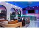 Outdoor bar with seating and a painted ceiling at 1261 Radiant St, Reunion, FL 34747