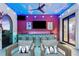 Outdoor bar with seating and a painted ceiling at 1261 Radiant St, Reunion, FL 34747