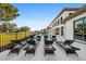 Luxury pool area with multiple lounge chairs and patio furniture at 1261 Radiant St, Reunion, FL 34747