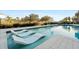 Relaxing pool area with in-pool loungers for ultimate comfort at 1261 Radiant St, Reunion, FL 34747