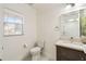 Updated bathroom with a modern vanity and toilet at 13820 Orchard Leaf Way, Winter Garden, FL 34787