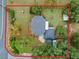 Aerial view of a house with a large backyard and shed at 1399 Old Mount Dora Rd, Eustis, FL 32726